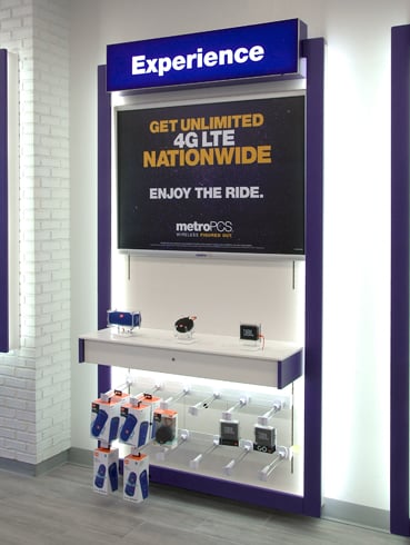 MetroPCS Wall mounted display with display shelf and sconce lighting